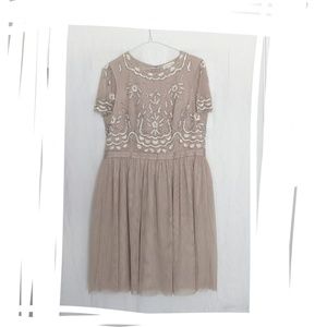 Monsoon beaded dress. Tan color.